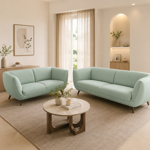 Capri sofa in soft mint, shown in a styled room