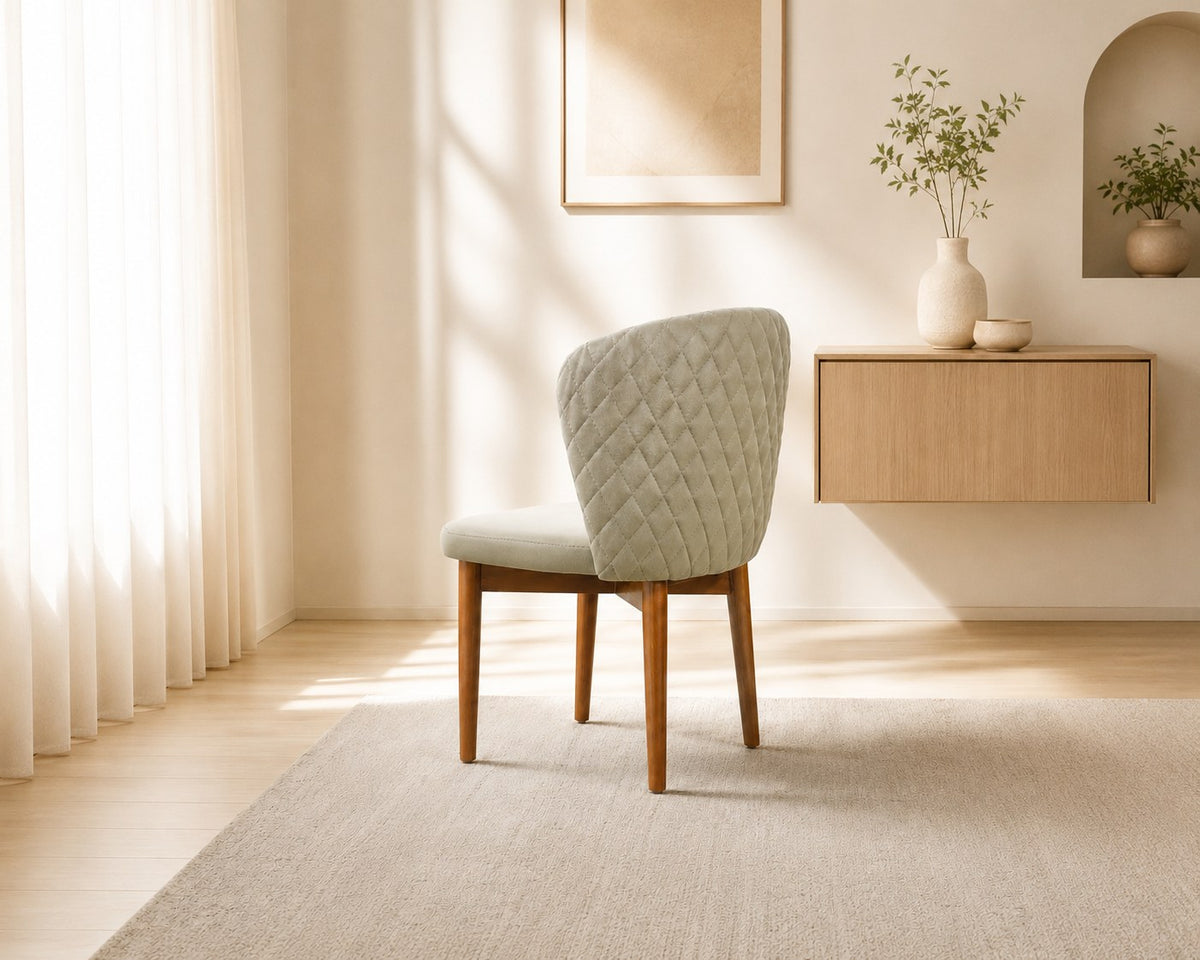 Celeste dining chair in pale sage, shown in a styled room