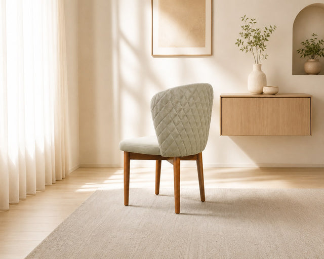 Celeste dining chair in pale sage, shown in a styled room