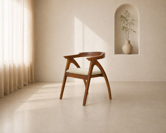 Orion accent chair in pale sage, shown in a styled room