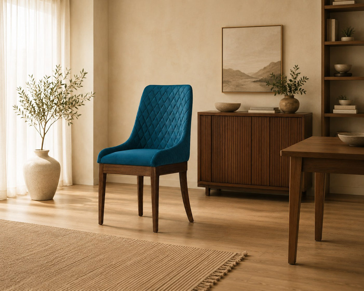 Marina dining chair in teal, shown in a styled room