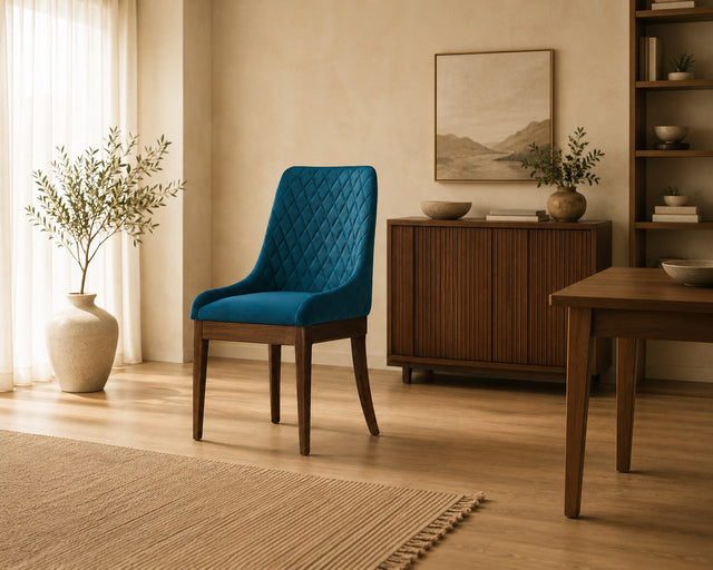 Marina dining chair in teal, shown in a styled room