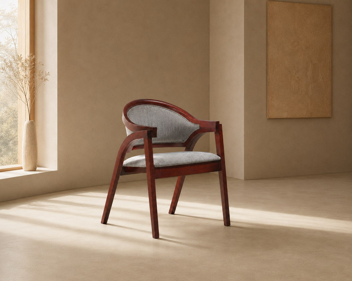 Rowan accent chair in grey, shown in a styled room