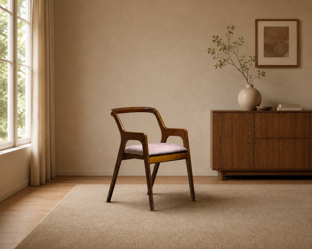 Mercer accent chair in dusty pink, shown in a styled room