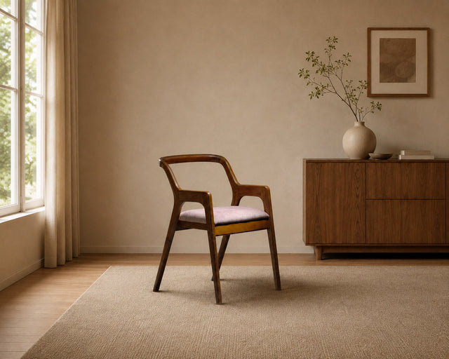 Mercer accent chair in dusty pink, shown in a styled room