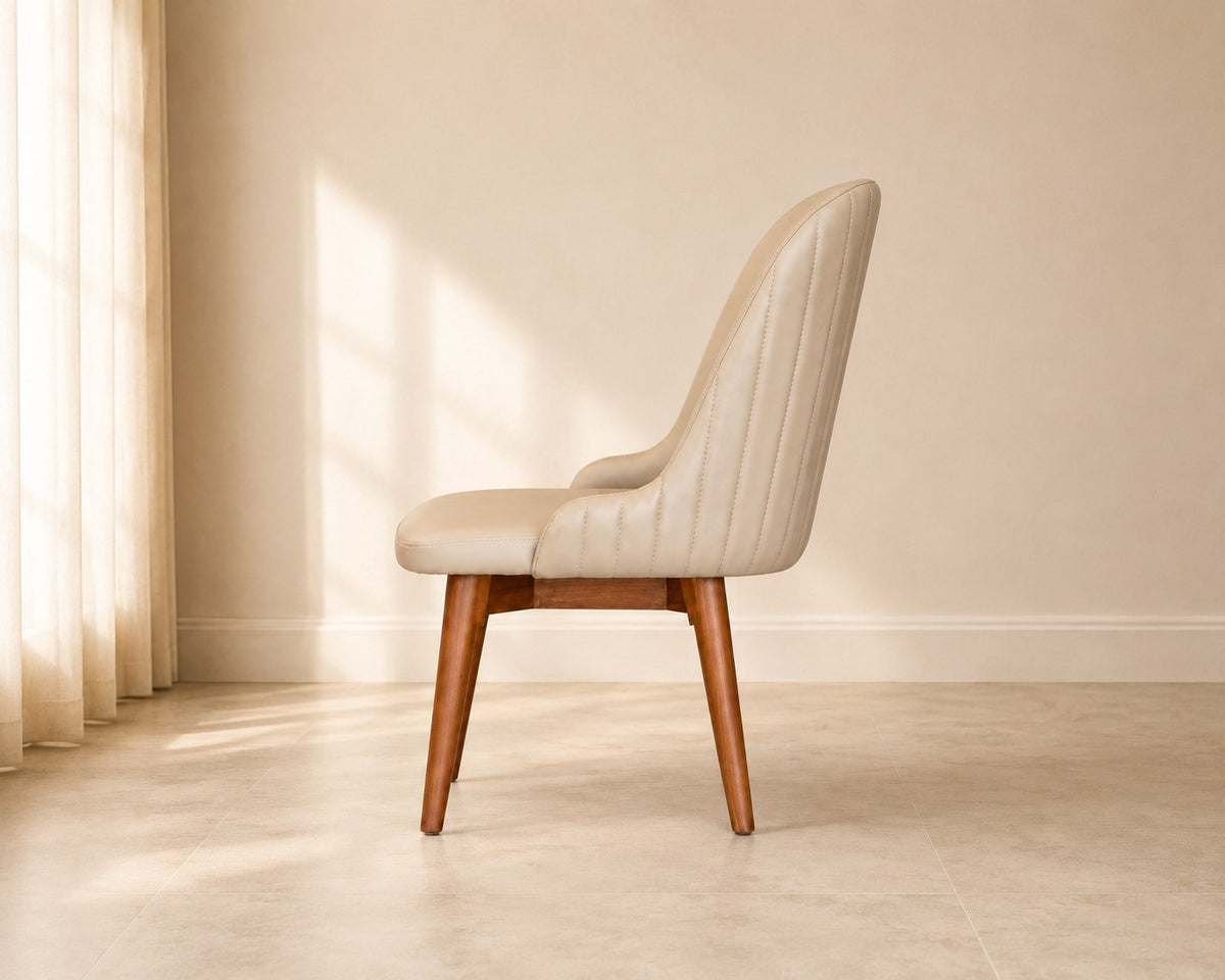 Alba dining chair in cream, shown in a styled room