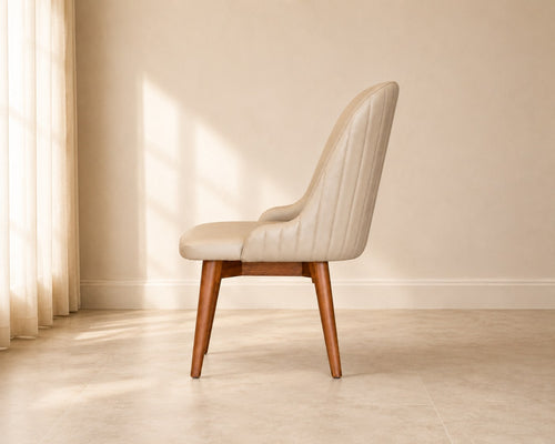 Alba dining chair in cream, shown in a styled room