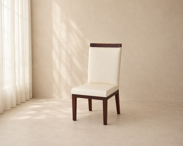 Noelle dining chair in cream, shown in a styled room