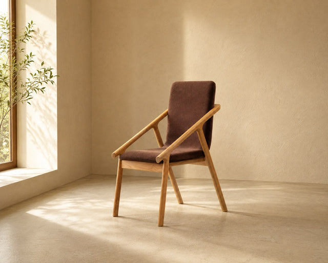 Solenne lounge chair in brown, shown in a styled room