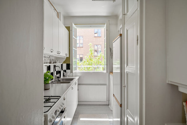 Straight (single-wall) kitchen layout — stock placeholder, pending real Liro photography