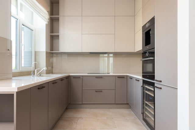 U-shaped kitchen layout — stock placeholder, pending real Liro photography